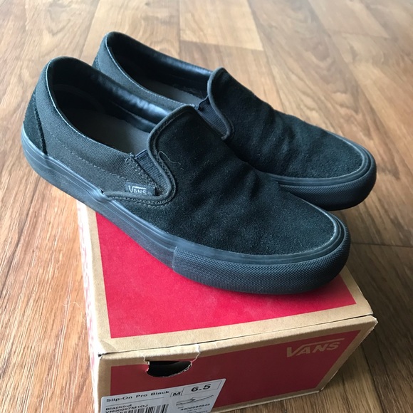 black vans slip ons men